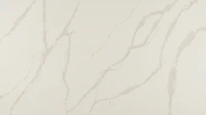 Polished Calacatta Bella quartz slab, creamy white with soft beige and gold veins