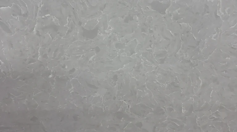 Polished Dior White quartz slab, soft cool gray with fine white wisps