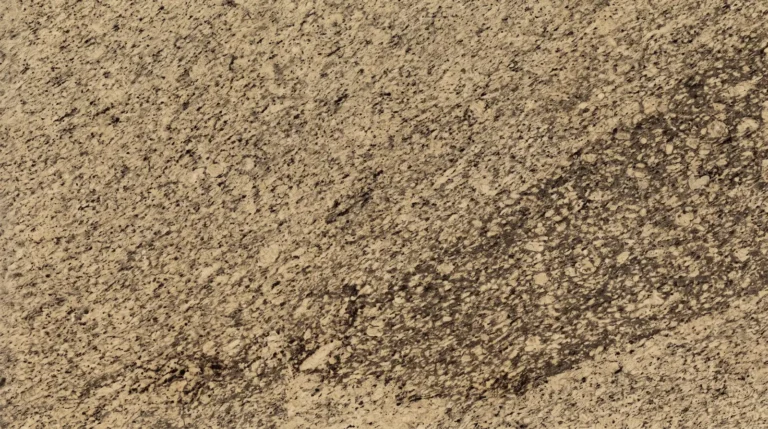 Giallo Ornamental granite, polished finish, close-up of the stone