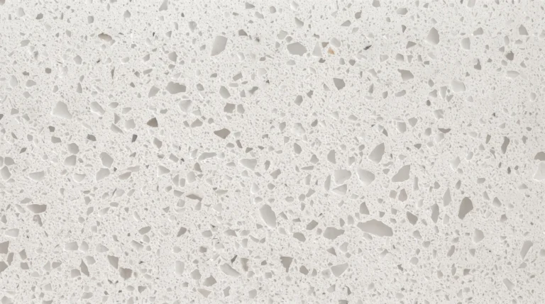 Polished Iced White quartz slab, white with scattered light gray chips
