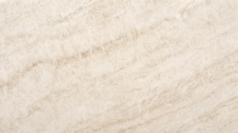 Polished Taj Mahal Quartz slab, warm ivory with layered beige movement