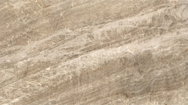 Taj Mahal quartzite slab, polished finish, warm beige and cream with soft flowing bands