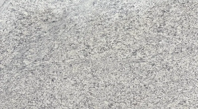 Polished White Napoli granite slab, off-white with gray and black speckles