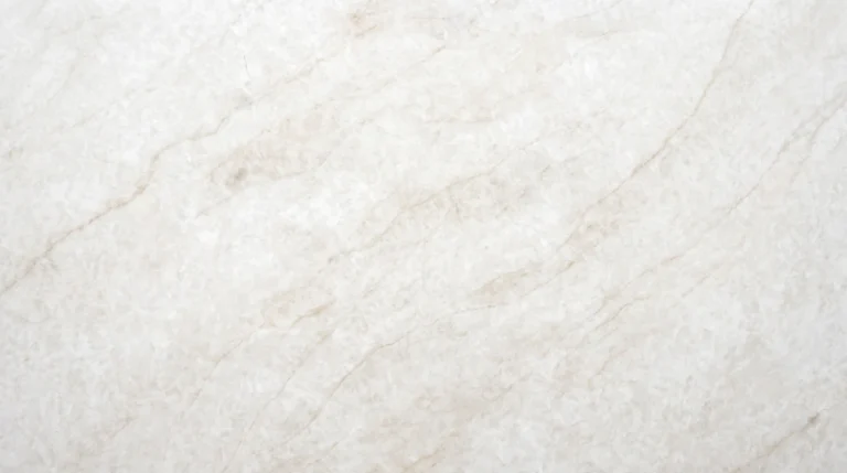 Polished White Taj Mahal quartz slab, cloudy white with delicate beige veins