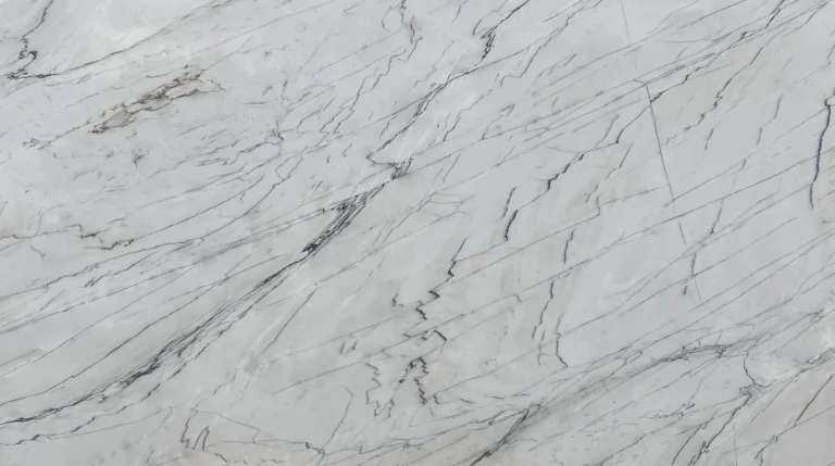 Yosemite Falls quartzite slab, polished finish, bright white with long fine gray diagonal veins